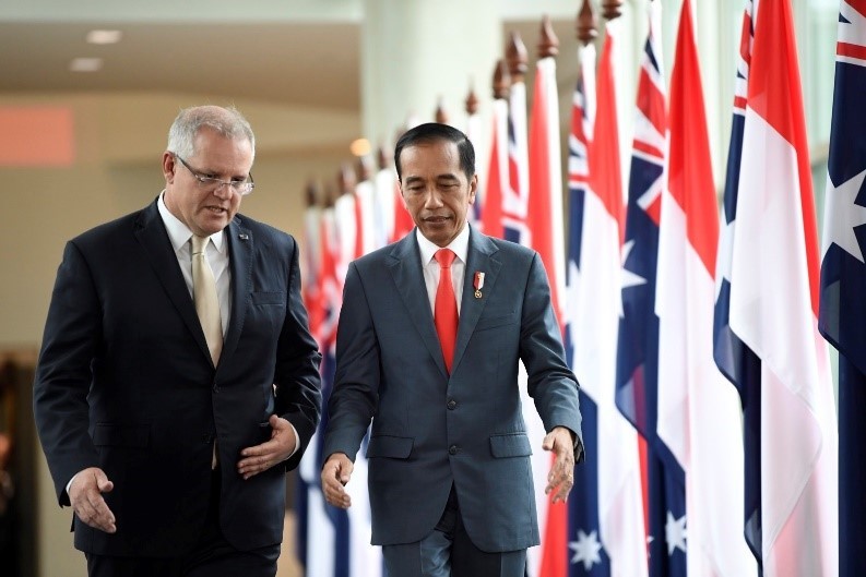 The Prime Minister and His Excellency Mr Joko Widodo, President of the Republic of Indonesia, leaving the House of Representatives following the President’s address to members and senators of the Parliament of Australia—the first address from an Indonesian President to the Australian Parliament in a decade. Credit: Auspic