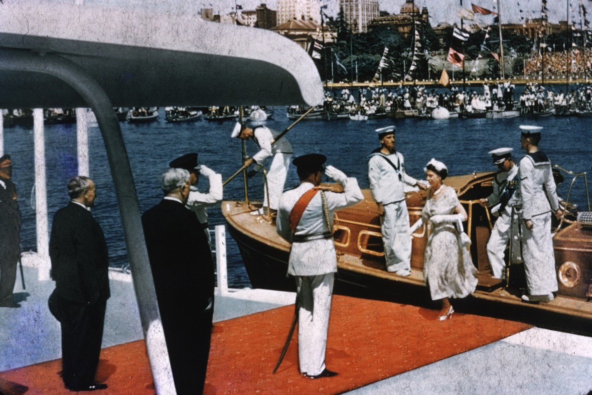 Her Majesty The Queen disembarks a small vessel at Farm Cove