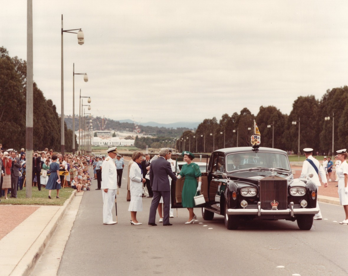 Her Majesty The Queen and The Duke of Edinburgh step out of a car in front of the National Naval Memorial