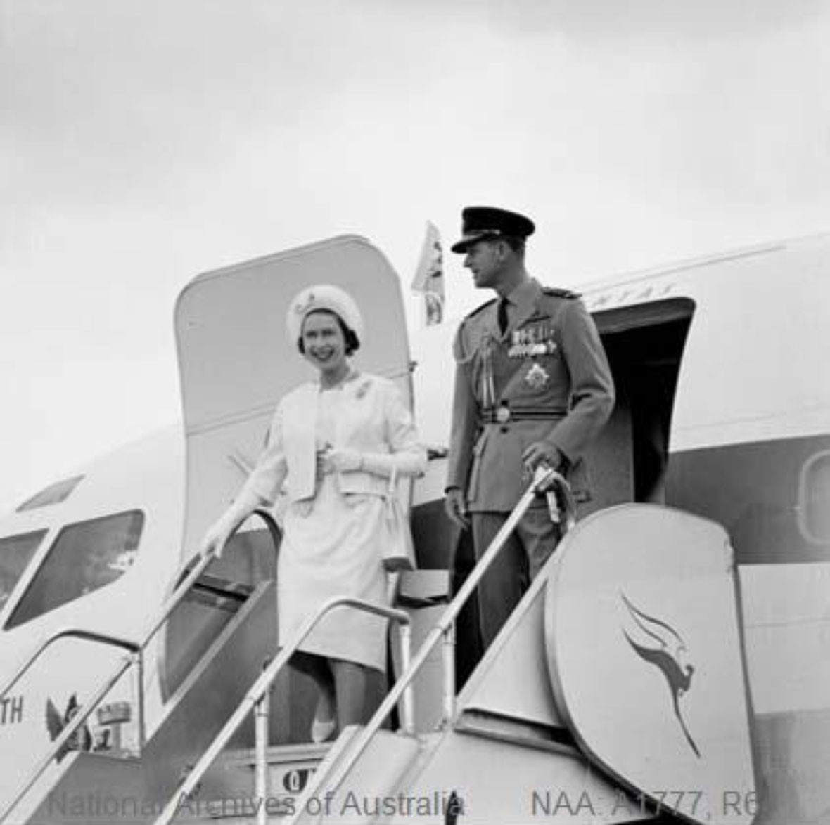 Her Majesty The Queen and The Duke of Edinburgh disembarking from a Qantas aeroplane