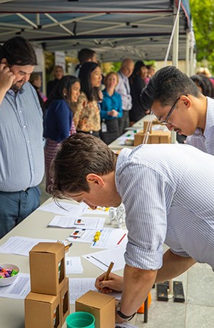 Staff at an Inclusion and Diversity cultural event