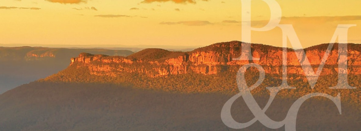 Landscape photograph of the blue mountains at sunset.