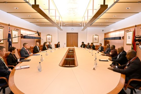 Ministers sitting around the table