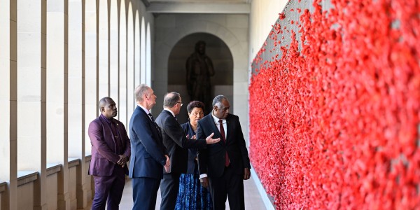 PMs (Australian and Vanuatu) and Ministers in front of the wall of poppies