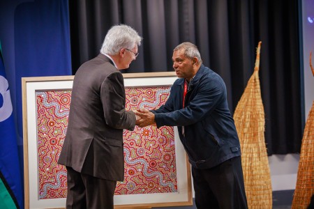 Mutburra, Tjingil and Limingun artist James Baban, handing over our official reconciliation artwork to Secretary, Professor Glyn Davis, AC during NAIDOC week.