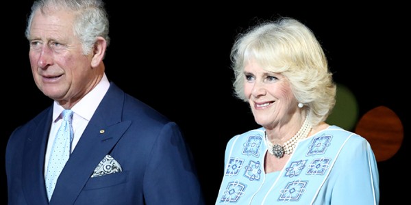 Charles, Prince of Wales and Camilla, Duchess of Cornwall in blue suits at the opening ceremony of the Commonwealth games on the Gold Coast.