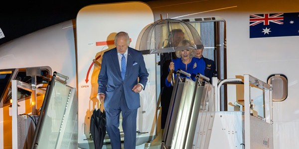 Their Majesties Camilla exiting a plane.