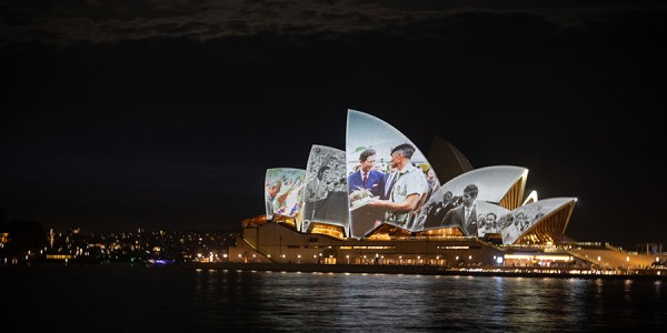 Sydney Opera House with images from The King's previous visits to Australia projected on its sails.