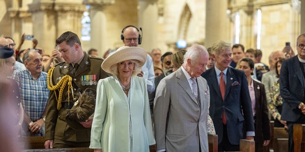 Their Majesties in the front pews at the St Thomas' Anglican Church. Every pew is filled.