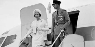 Her Majesty The Queen and The Duke of Edinburgh disembarking from a Qantas aeroplane