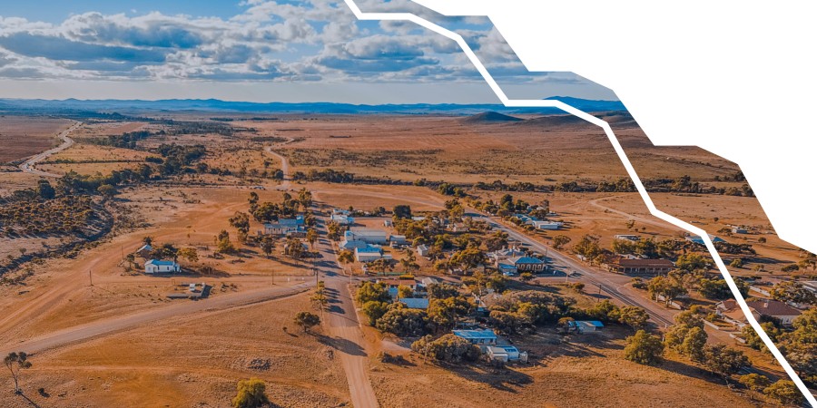 Image of Australian outback with graph lines going down one edge